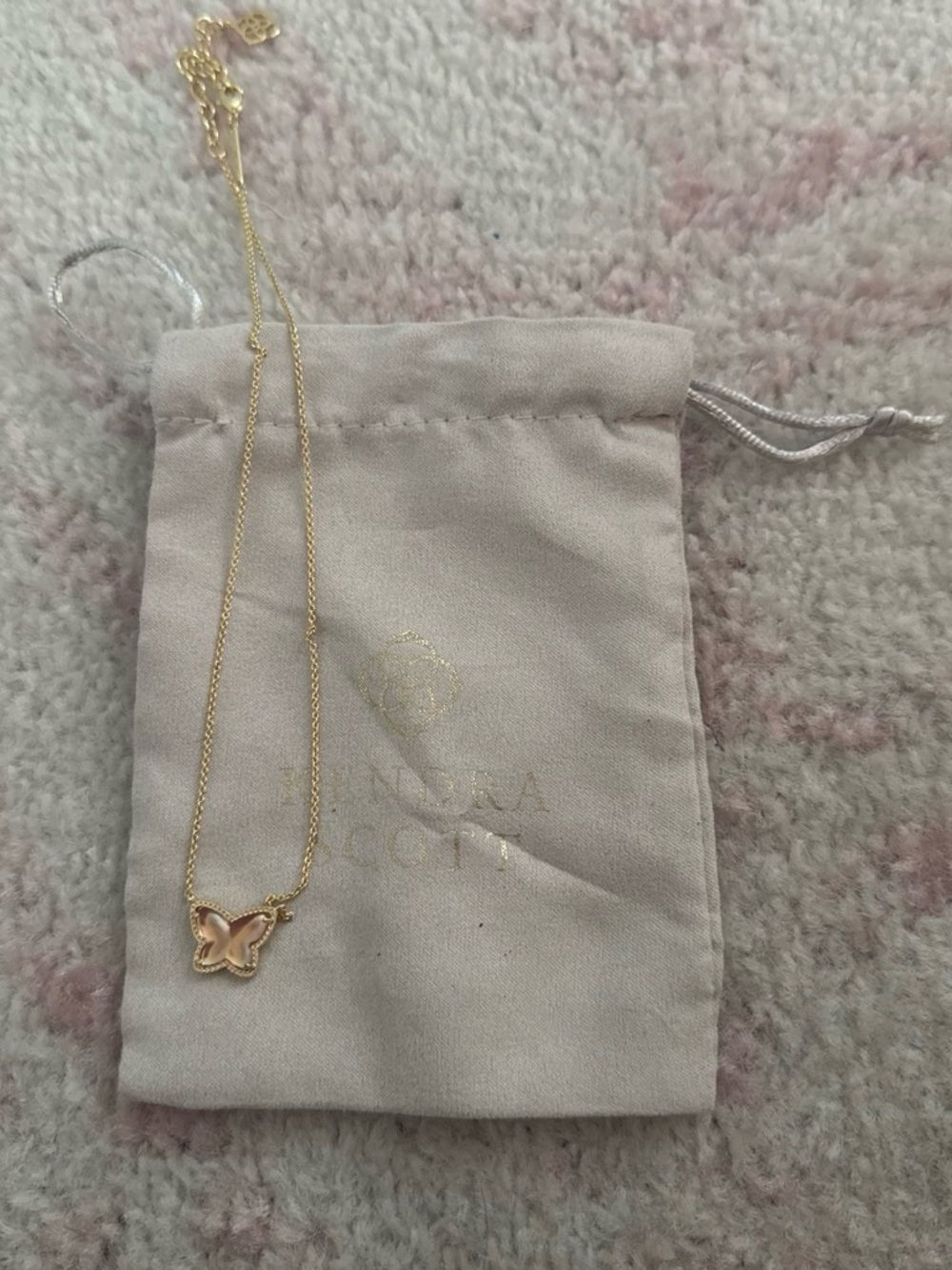 Kendra Scott Gold Butterfly Necklace with Pink Center